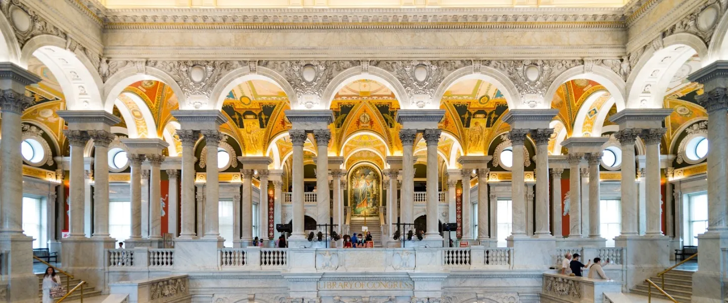 The ornate Great Hall of the Library of Congress features marble columns, vaulted ceilings and vibrant murals.